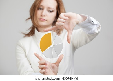 Woman shows a pie chart, circle diagram. Business analytics concept.