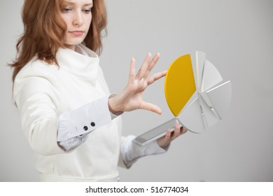 Woman shows a pie chart, circle diagram. Business analytics concept.