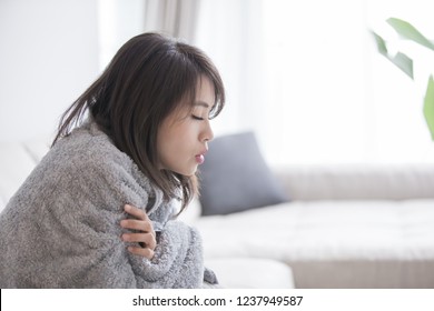 Woman Sick And Feel Cold At Home