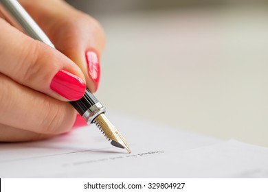 Woman Signing Contract 