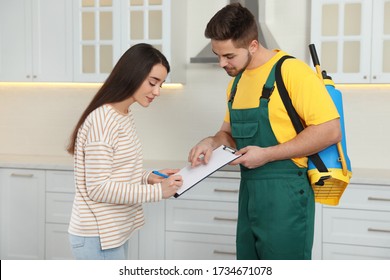 Woman signing documents at home. Pest control service - Shutterstock ID 1734671078