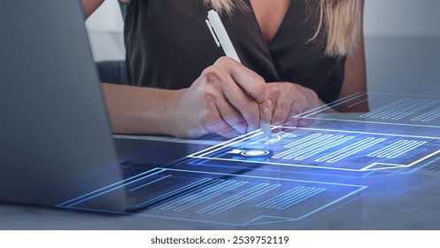 A woman signs a digital contract using a stylus pen, on a holographic interface. Business setting. Concept of secure online document signing - Powered by Shutterstock