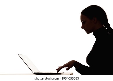 Woman Silhouette. Online Learning. Distance Education. Dark Contrast Profile Shape Portrait Of Smart Female Student Working With Laptop In Virtual Class Isolated On White Empty Space Background.