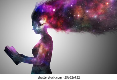 A woman in silhouette reading a book with the universe.