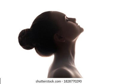 Woman Silhouette. Recreation Tranquility. Profile Portrait Of Peaceful Lady With Bare Shoulders Closed Eyes Isolated On White Copy Space Background. Face Contouring. Aesthetic Cosmetology.