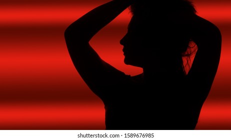           Woman Silhoutte On Red Background                     