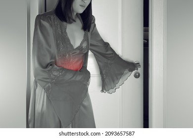 The Woman In Silk Nightwear And Red Robe Wake Up For Go To The Toilet, Women With Menstrual Disorders At Night, Menstrual Cramps, Irritable IBS Or Bowel Syndrome