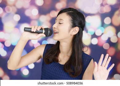 Woman Singing Karaoke