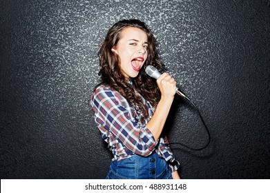 Woman Singing With Microphone