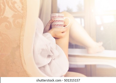 Woman Sipping Coffee In A Magic Moment Of Quiet