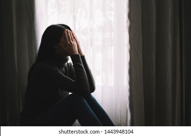  woman sit Depression and anxiety Copy space. - Shutterstock ID 1443948104