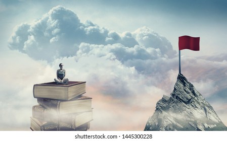 Woman sits on a stack of books looking to a red flag on a mountain peak at high altitude.The concept of scholarship.