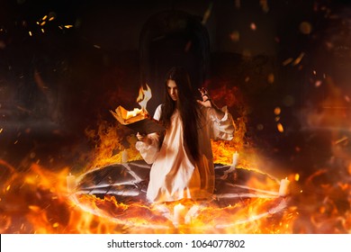 Woman sitting in burning pentagram circle, magic