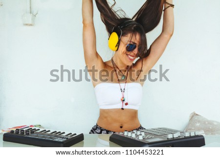 Similar – woman sitting with mixing table, in the terrace