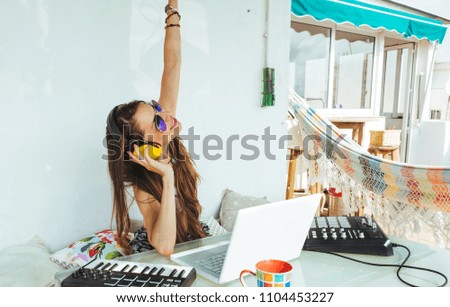 Similar – woman sitting with mixing table, in the terrace