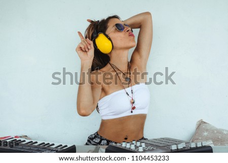 Similar – woman sitting with mixing table, in the terrace