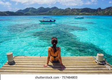 Woman Sitting On The Deck In Crab Cay (Cayo Cangrejo), Providence Island (Isla De Providencia), Colombia