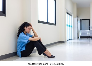 Woman sitting on floor have depression. woman patient in a floor is discouraged at hospital