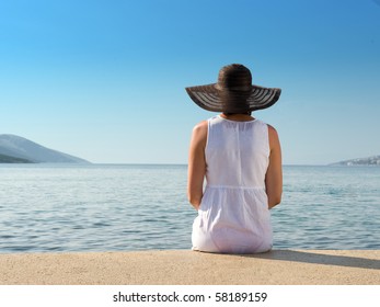 Woman Sitting On Sea Stock Photo 58189159 | Shutterstock