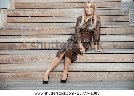 Similar – Image, Stock Photo Blonde girl wearing white sweater smiling in the street