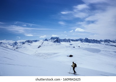 A Woman Ski Touring In The Chugach Mountains Near Valdez, Alaska, USA