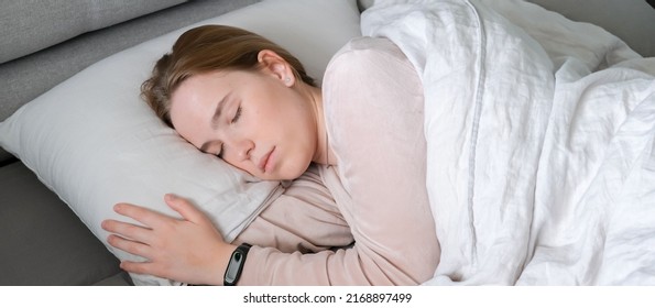 Woman Sleeping In Bed. Circadian Rhythm Optimization. Fight Insomnia.Recovery Of Health In A Dream