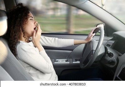 Woman sleeping in car