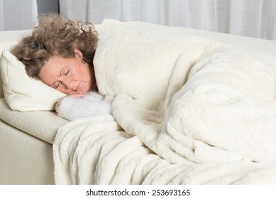 Woman Sleeping On Couch