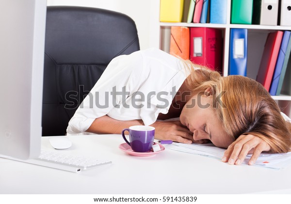 Woman Sleeping On Her Desk Stock Photo Edit Now 591435839