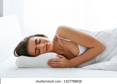 Woman Sleeping On Orthopedic Pillow