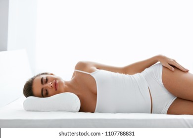 Woman Sleeping On Orthopedic Pillow