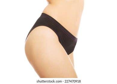 Model looking ass in black panty and long slender legs