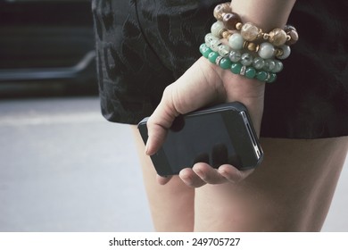 Woman with smart phone - Shutterstock ID 249705727