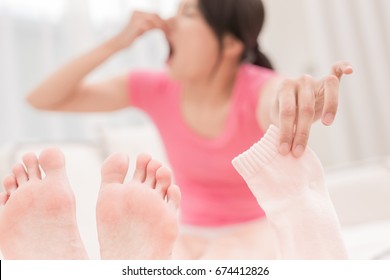 Woman With Smelly Socks In The Room