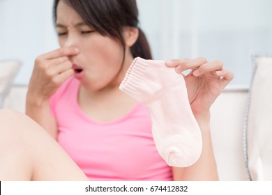 Woman With Smelly Socks In The Room