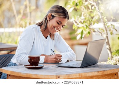 Woman with smile, writing notes and student, education with study and online course, elearning and university. Female at outdoor cafe, distance or remote learning with research for school project - Powered by Shutterstock