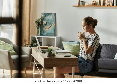 Woman smiles while sipping coffee in a bright and inviting workspace. - Powered by Shutterstock