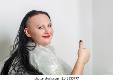 Woman Smiling With Half Shaved Head In Barber Chair Showing Class. Horizontal Photo