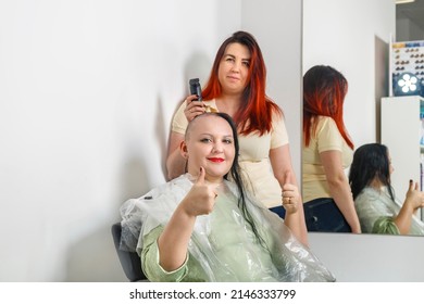 Woman Smiling With Half Shaved Head In Barber Chair Hairdresser Taking Photo. Horizontal Photo