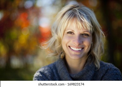 Woman smiling at the park