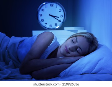 Woman Smiling While Sleeping. Probably Having A Nice Dream.