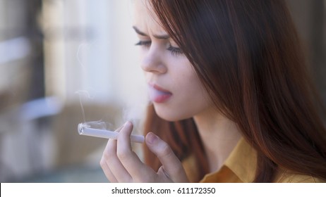 Woman Smokes