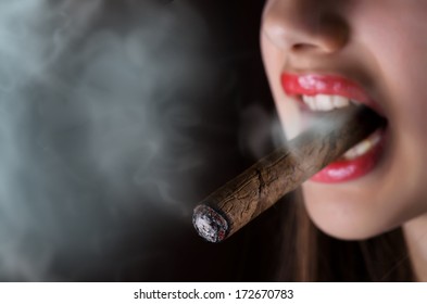 Woman Smoking Cigar.