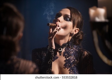 Woman Smoking A Cigar