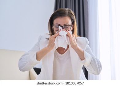 Woman Sneezes In Handkerchief, Businesswoman Got Sick In The Office, With Symptoms Of Respiratory Disease. Seasonal Colds, Allergy Seasonal, Flu Season, Pandemic