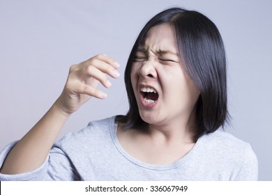 Woman Sneezing