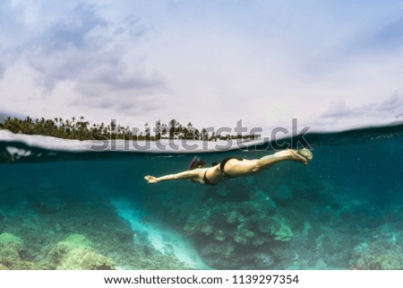 Woman snorkeling in Hawaii
