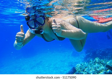 Woman Snorkeling In Red Sea