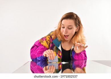 Woman Snorting Drugs From A Mirror