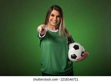 woman soccer fan cheering for her favorite club and team. world cup green background. - Shutterstock ID 2218146711